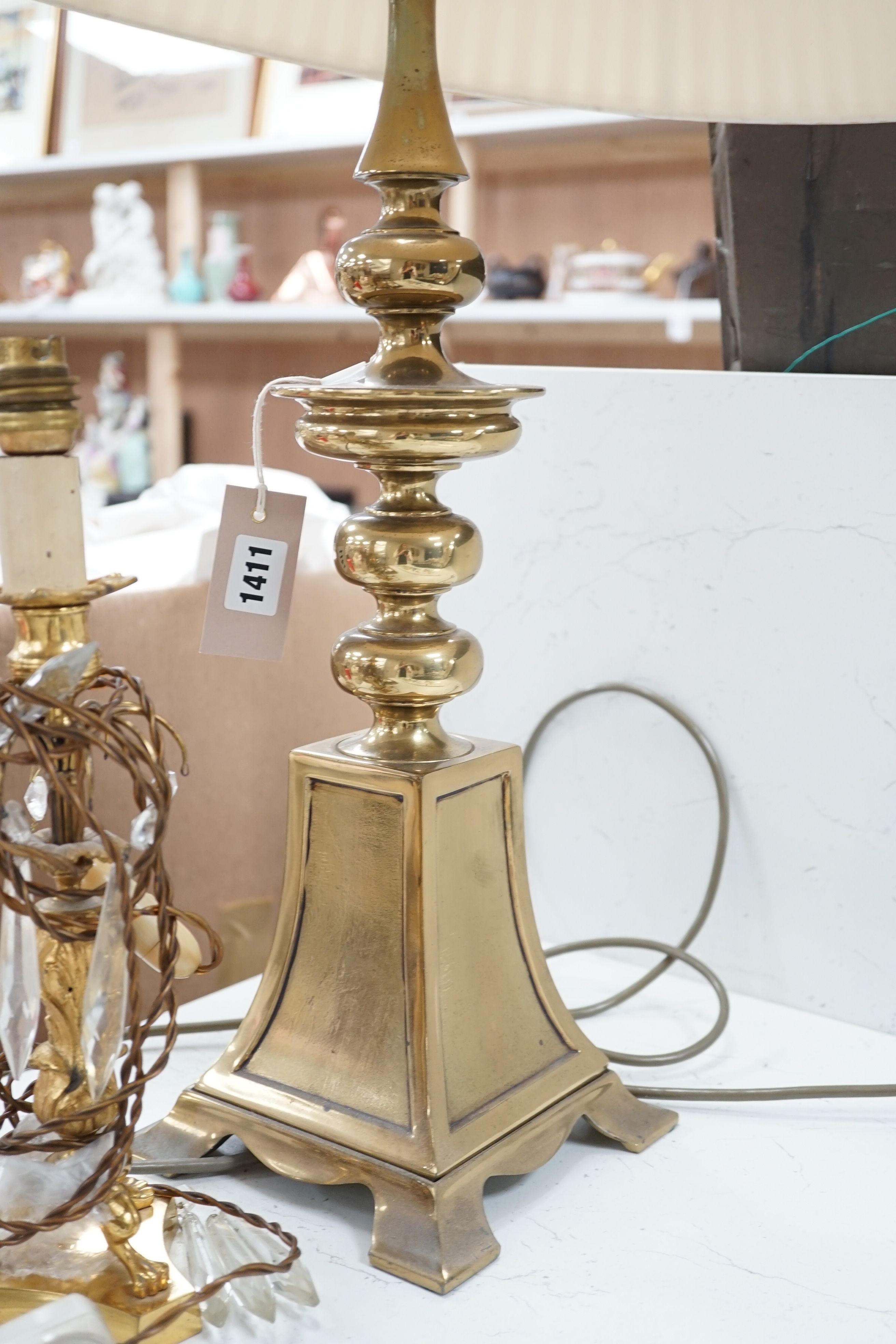 A large brass table lamp and a gilt metal and lustre hung table lamp, table lamp 50 cms high not including light fitting.